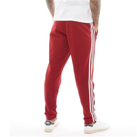 adidas sst trainingshose herren jogginghose rot|Rote Jogginghosen .